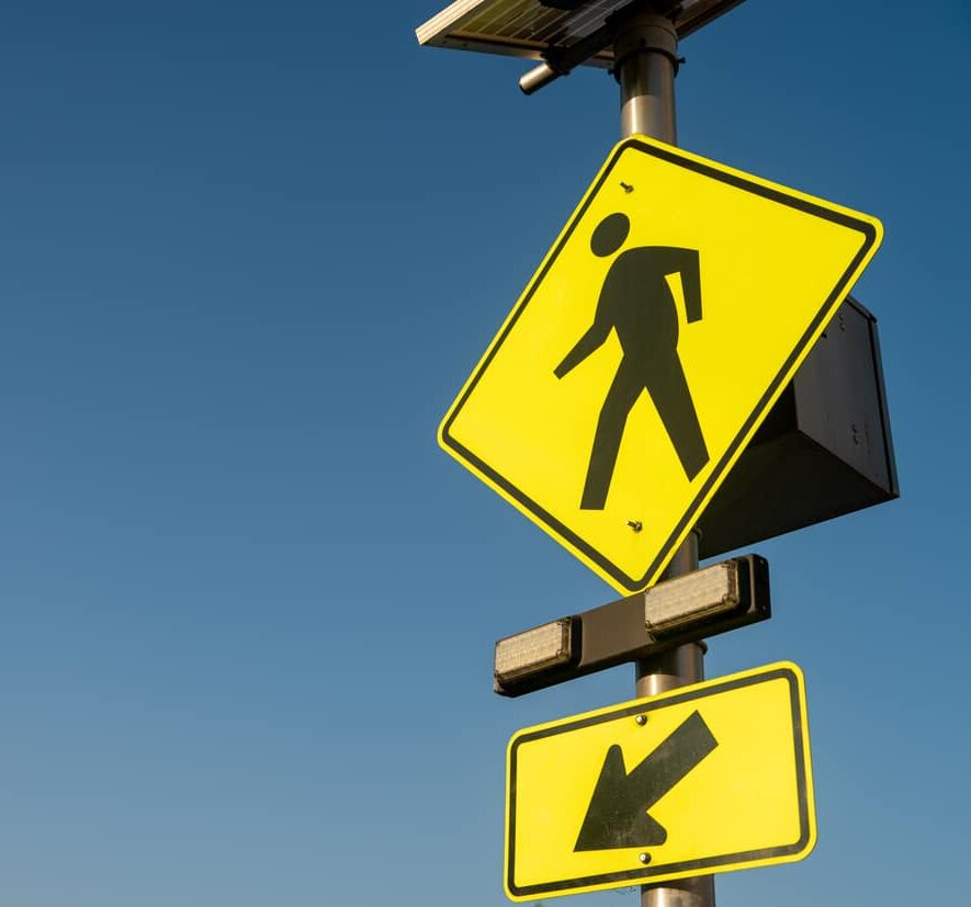 Close up of walking sign