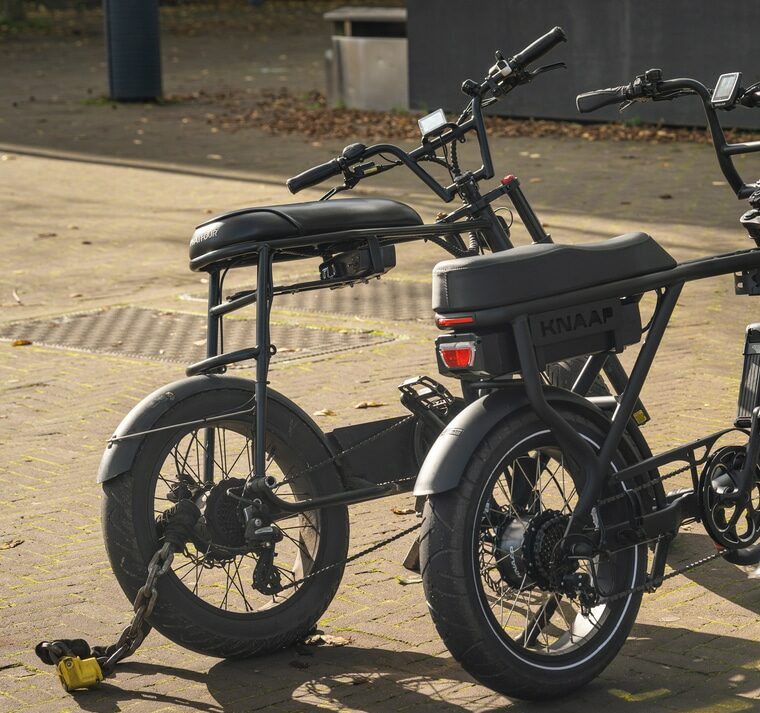 Fatbikes parked in the street, electric bicycles with large tires