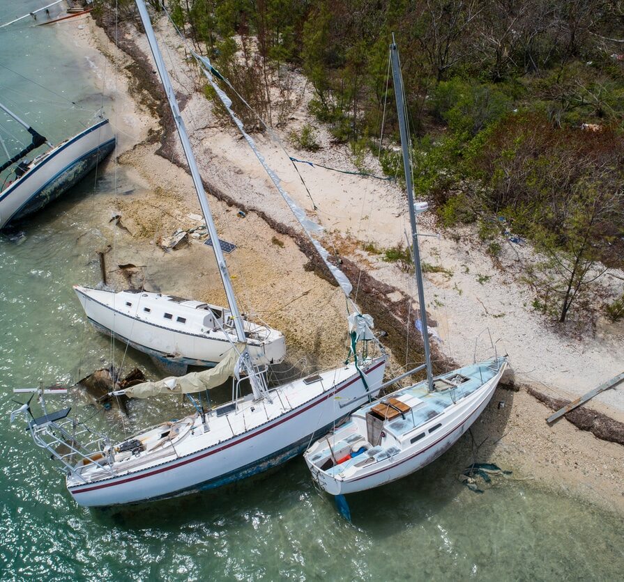 Sailboats washed ashore